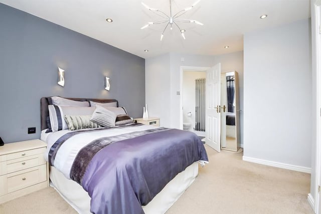 The bedroom benefits from fitted wardrobes and en-suite facilities.