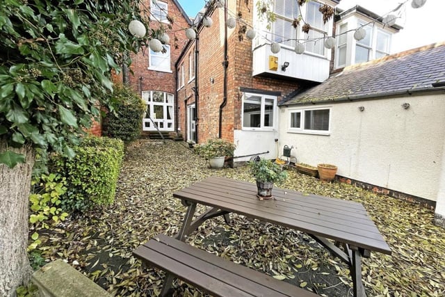 The rear garden is ideal for hosting guests in the hot simmer nights.