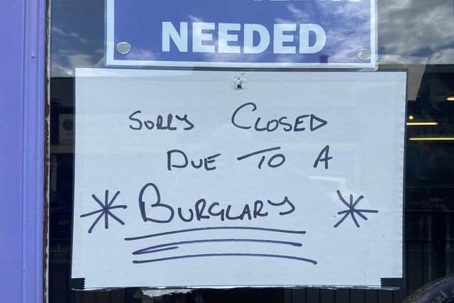 A sign in the window as the shop was closed on Tuesday. Picture by FRANK REID