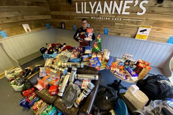 Trevor Sherwood inside LilyAnne's Wellbeing with items that have been donated by Tata Steel and Middlesbrough Jobcentre.