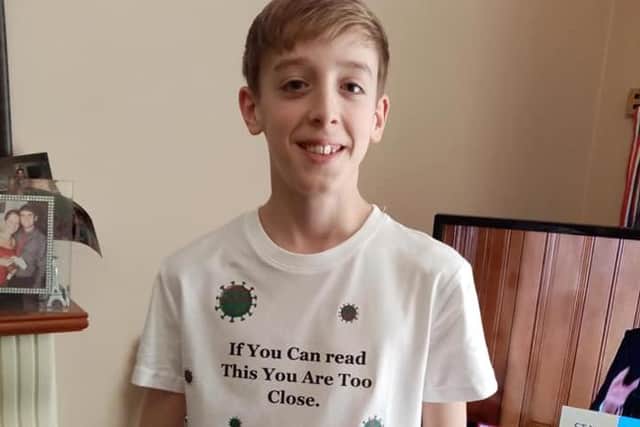Ben Turnbull with the T-shirt he designed during a Coronavirus lockdown project.