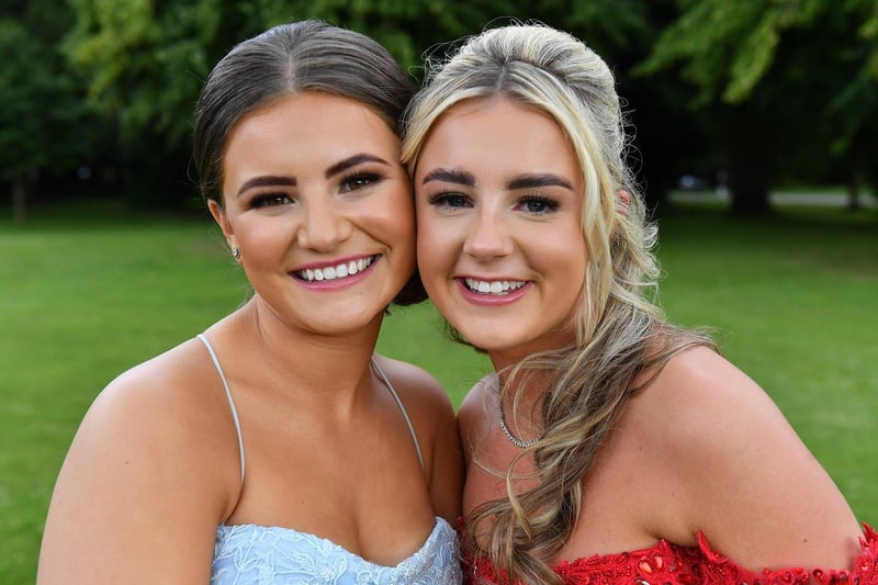 Lucia Bailey and Isla Appleby strike a pose during their school prom.