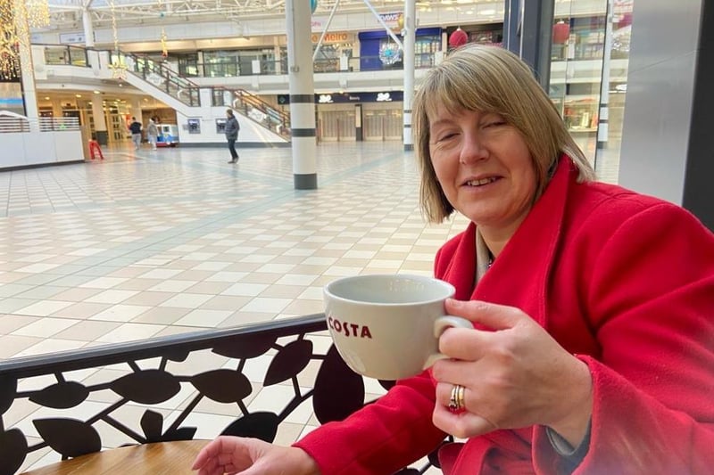 Pauline Harrison, from Blackhall, enjoys a cuppa while waiting for the shops to open.