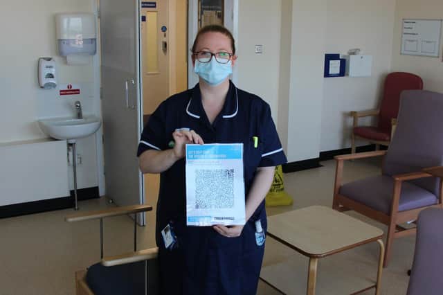 Rachel De Silva - Assistant Senior Clinical Matron, with one of the posters.