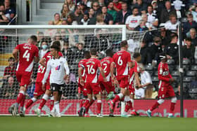 Middlesbrough players celebrate after scoring at Fulham.