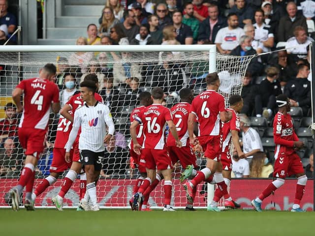 Middlesbrough players celebrate after scoring at Fulham.