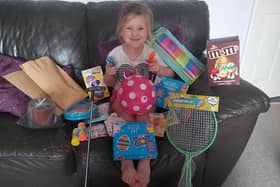 Young carer Emmie Morrill pictured with one of the special packs.