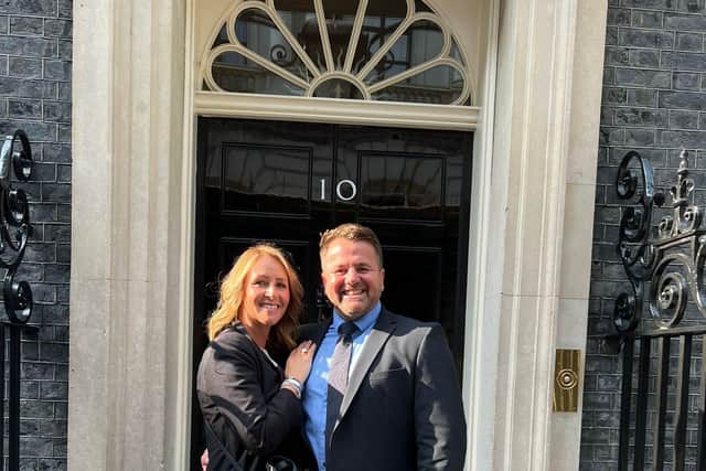 Orangebox Training Solutions' CEO Simon Corbett and his wife Hayley outside No 10.