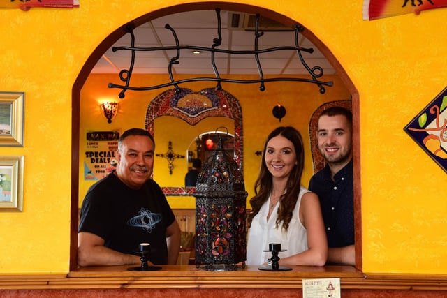 Restaurant owner Krimo has now retired and is pictured standing alongside new owners of Casa del Mar, Chris and Laura Wilkinson, in 2017.