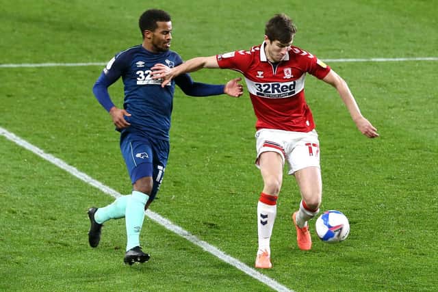 Middlesbrough's Paddy McNair battles for possession.
