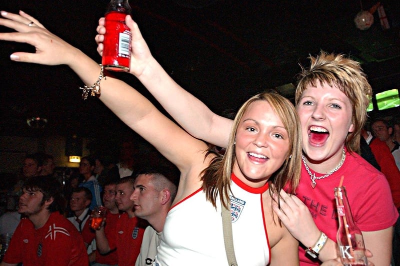 England fans in happy mood in the Sports Bar during Euro 2004.