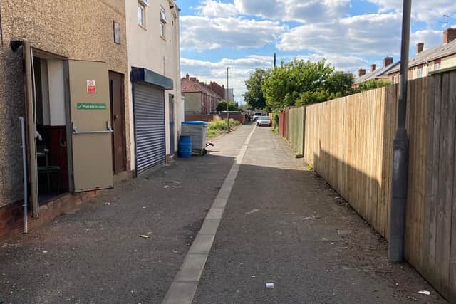 The back lane off Shields Terrace remained cordoned off throughout Sunday as inquiries were carried out.