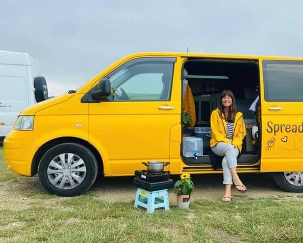 Kelly Williams in her Yellow Van of Love.