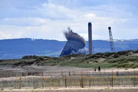 The demolition of the Redcar Power Station chimney stack, triple flare stack and gas holder.