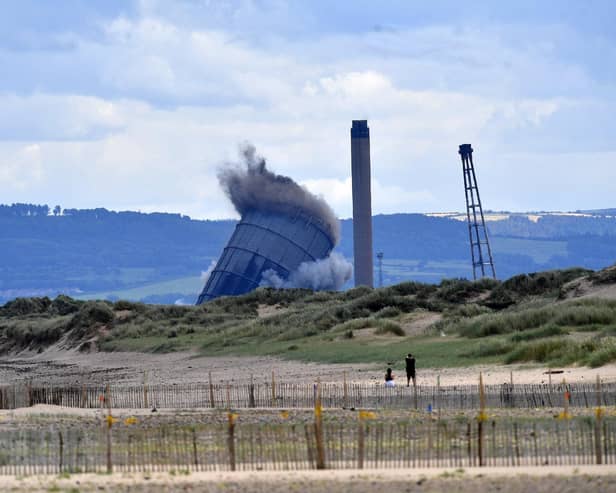 The demolition of the Redcar Power Station chimney stack, triple flare stack and gas holder.