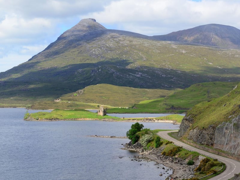 The triple summits of Quinag provide a dramatic backdrop to nearby Loch Assynt, in Sutherland. It made up of three separate Corbetts - Spidean Coinich, Sail Gorm and Sail Gharbh, that make for an incredible day's walking for experienced hikers.