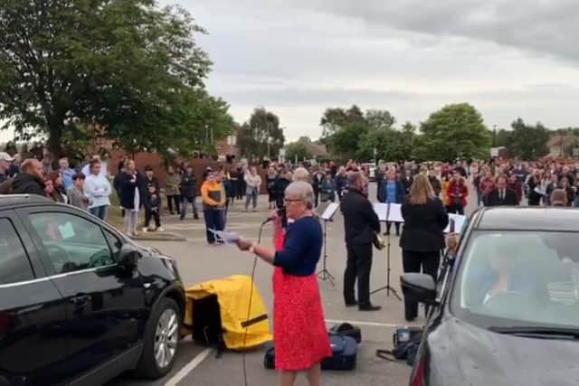 Sue Leonard leads a tribute to Cliffy in the car park of Hartlepool hospital.