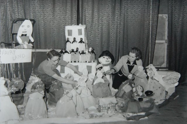School staff create a Christmas landscape back in the 1950s. Do you recognise the school?