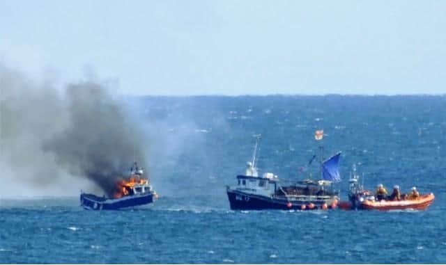 Rescue crews were called in after reports of a fishing boat on fire./Photo: Steven Barker