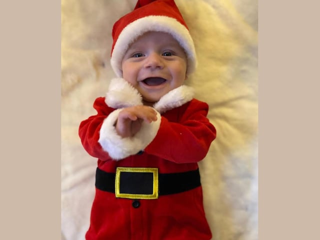 Henry, age 4 months, ready to celebrate his first Christmas.