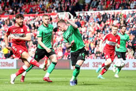 Matt Crooks (L) of Middlesbrough shoots to score during the Sky Bet Championship match between Middlesbrough and Stoke City. (Photo by Nigel Roddis/Getty Images).
