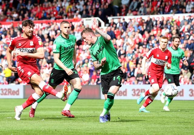 Matt Crooks (L) of Middlesbrough shoots to score during the Sky Bet Championship match between Middlesbrough and Stoke City. (Photo by Nigel Roddis/Getty Images).