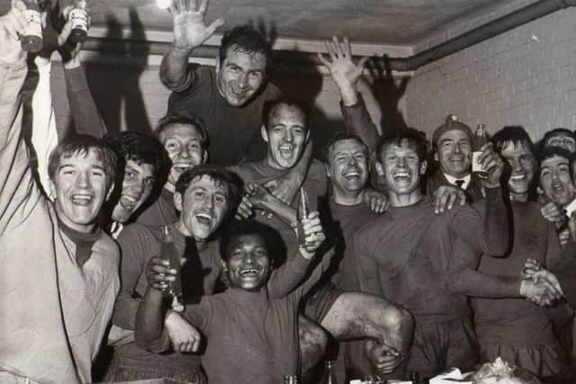 Celebration scenes in the Hartlepool United's changing room following the successful 1968 promotion campaign.