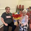 Mary receives flowers after organising Horden Salvation Army talent show