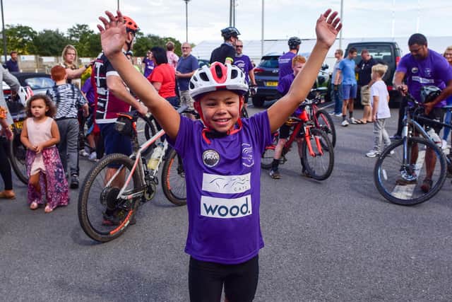 Lewin Tubuna, 9, pictured at the end of his 2018 Coast to Coast cycle ride which raised more than £2,800 for Alice House Hospice.