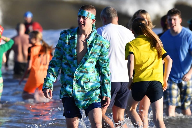 Another dipper takes the plunge at the Boxing Day dip at Seaton Carew. Picture by FRANK REID
