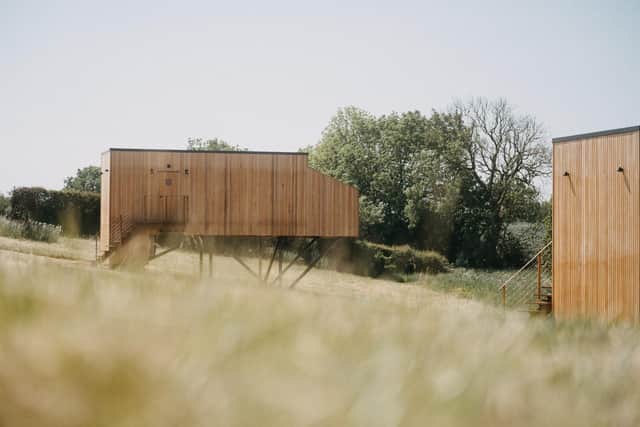 The two elevated treehouses stand apart from the rest of the development on Red Hurworth Farm, near Wingate