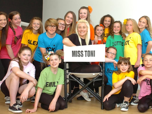 Dance teacher Toni Parker Harvey with some of her students at she launched her new business premises on Park Road in 2013.