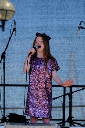 Young performer Abigail delights crowds at the Waterfront Festival. Picture: Carl Gorse.