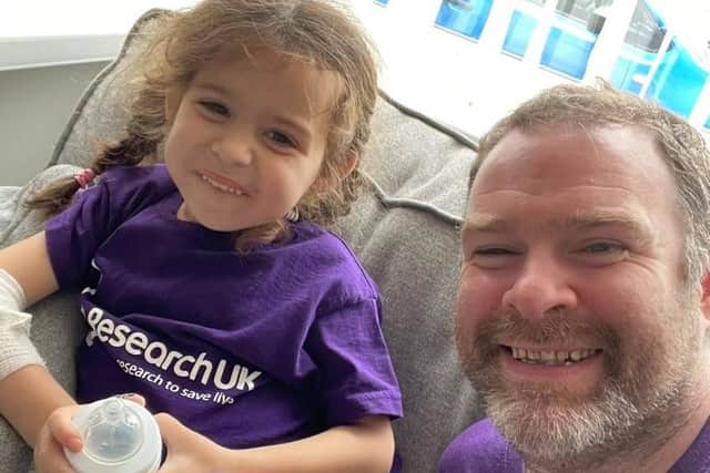 Gavin Lancaster at home with Poppy. Photo: Kidney Research UK