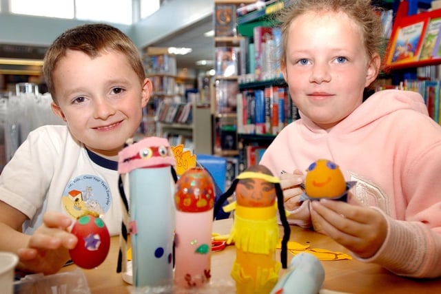 Kids get to work painting Easter eggs at the Owton Manor library in 2006.