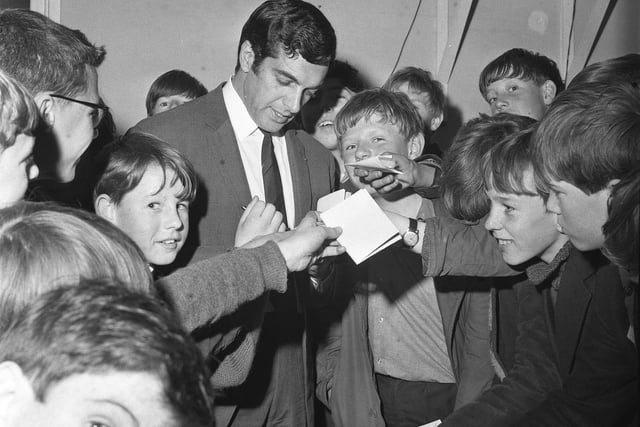 Singer Frankie Vaughan is pictured signing autographs during a visit to Hartlepool Boys Welfare Club possibly in the 1960s or 1970s. Frankie was a supporter of the National Association of Boys' Clubs for many years.