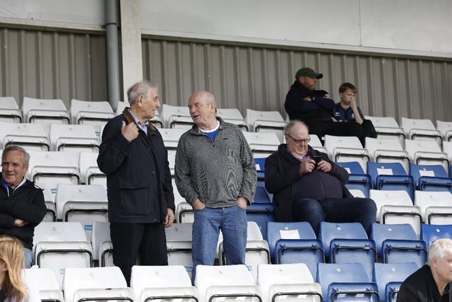 Fans discuss the game during a break. Photo: Mark Fletcher | MI News