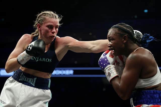 Savannah Marshall punches Claressa Shields during the IBF, WBA, WBC, WBO World Middleweight Title fight on Boxxer's fight night which is the first women's only boxing card in the UK at The O2 Arena on October 15, 2022 in London, England. (Photo by James Chance/Getty Images)