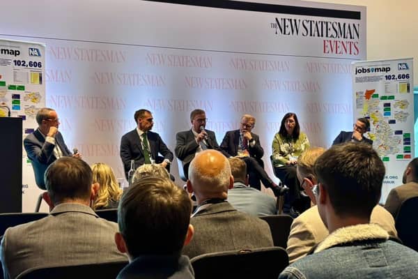 Hartlepool MP Jonathan Brash, seated centre on stage, speaks at a New Statesman event at the Labour Party conference.