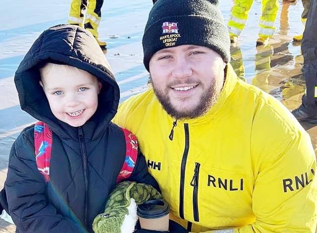 Jake Oates, volunteer at the Hartlepool RNLI, with his son Jacob Oates.