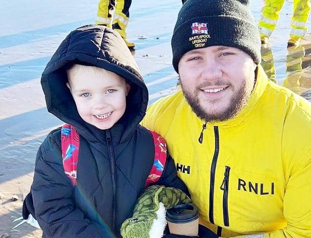 Jake Oates, volunteer at the Hartlepool RNLI, with his son Jacob Oates.