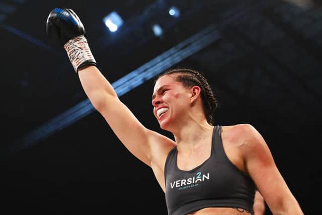 Savannah Marshall celebrates victory after the WBO World Middleweight title fight with Lolita Muzeya at Utilita Arena on October 16, 2021 in Newcastle upon Tyne, England. (Photo by Stu Forster/Getty Images)