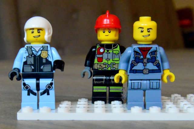Three men figures from the Lego City range. Picture by FRANK REID