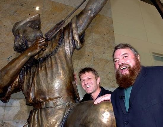 Film stars Sean Bean and Brian Blessed are pictured with the statue of Robin Hood at Robin Hood Airport.