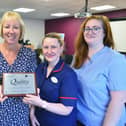 McKenzie Group Practice staff (left to right) Paul and Nikki Easton, Rachel Kennedy and Jayne Allison with their award.