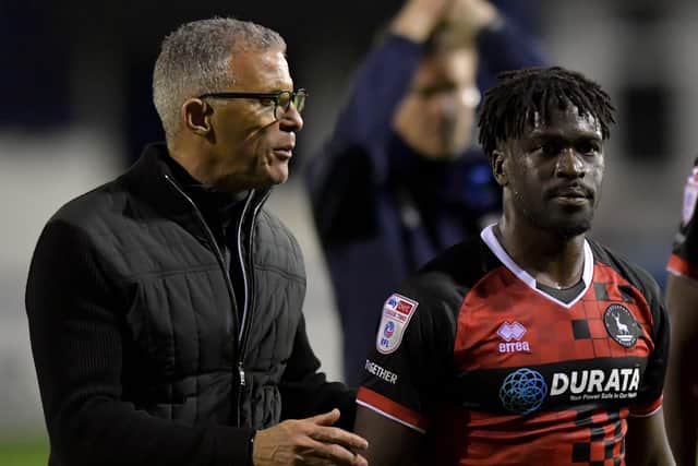 Hartlepool United's Interim Manager Keith Curle and new signing Chris Missilou after the League Two game at Barrow. (Credit: Scott Llewellyn | MI News)