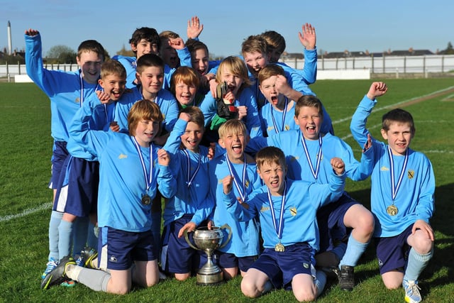 High Tunstall celebrate winning their Hartlepool Schools' Association Year 7 football cup final against St Hild's.