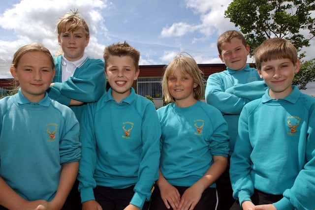 Pupils take part in the school's challenge advert in 2003.