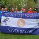 The South East Poolies proudly show their colours.
