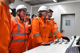 Hartlepool MP Jill Mortimer (centre) presses the button to start the production process at STRABAG. Photo: Frank Reid